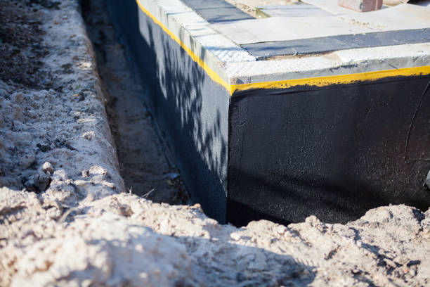 Professional Basement Waterproofing technician working in Garnet Valley, PA